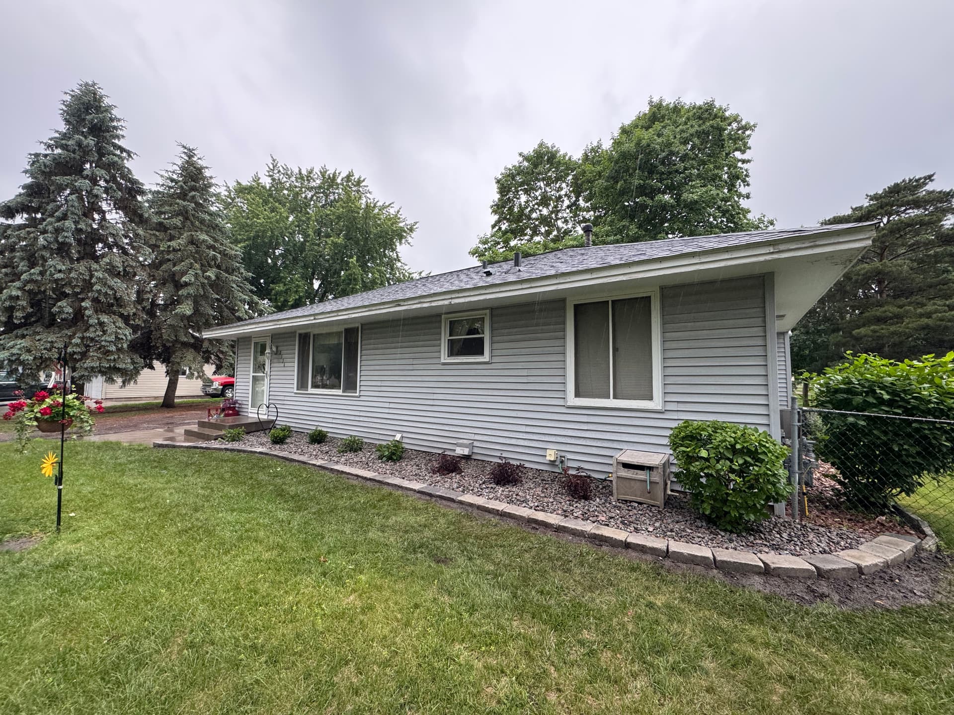 Cottage Grove Garden Bed Cleanup With New Shrubs and Stone