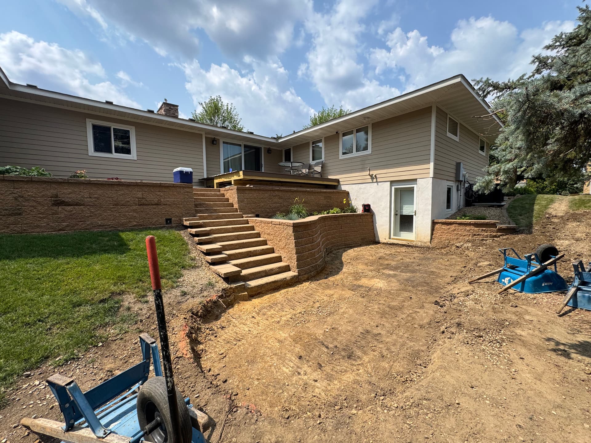 Retaining Wall and Dual Patio Build Taking Shape in Saint Anthony