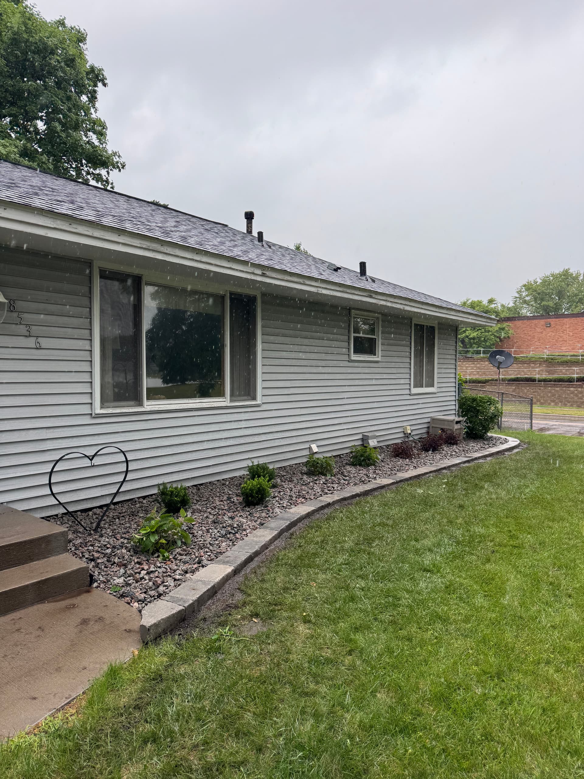 Cottage Grove Garden Bed Cleanup With New Shrubs and Stone