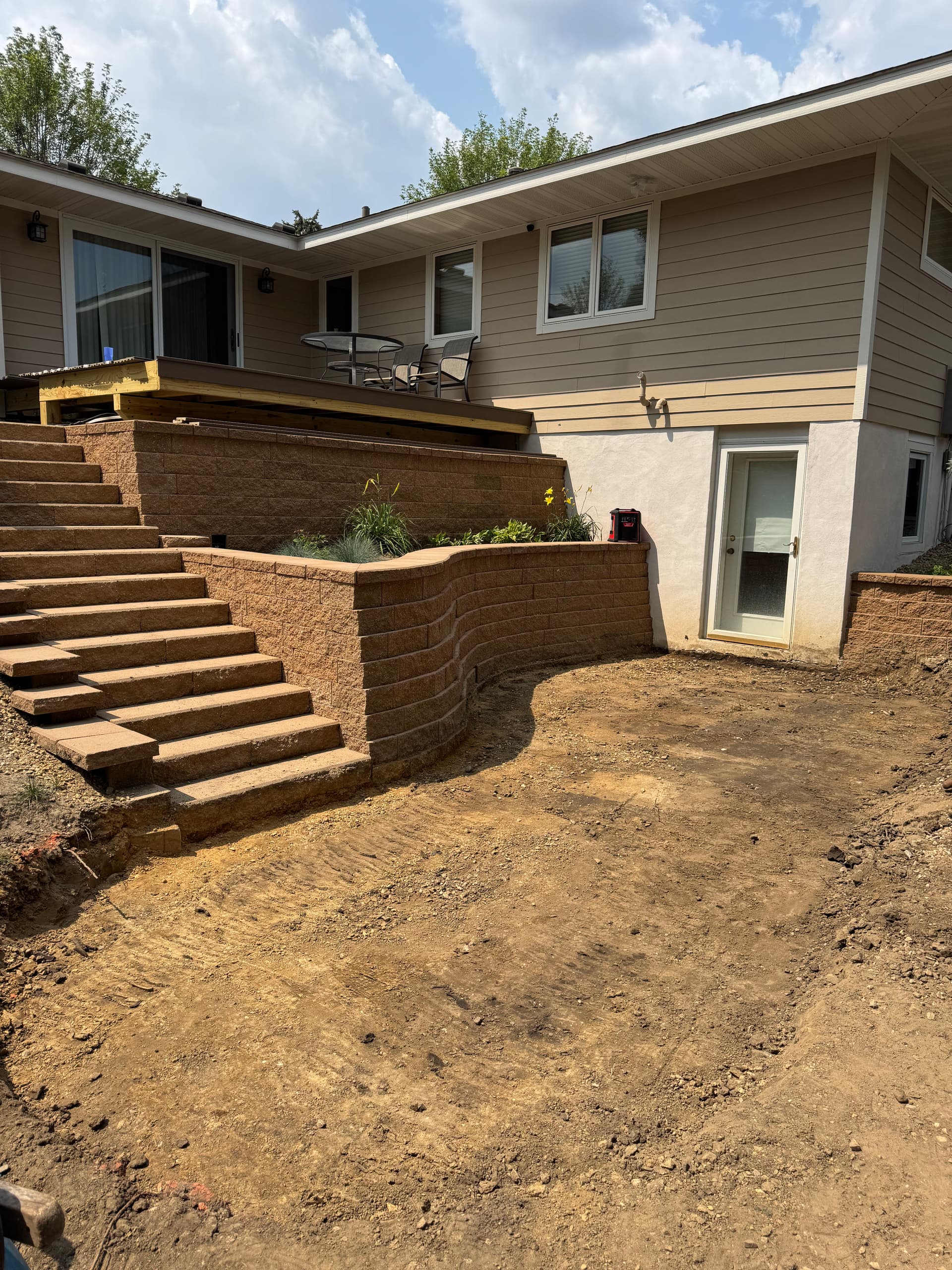 Retaining Wall and Dual Patio Build Taking Shape in Saint Anthony
