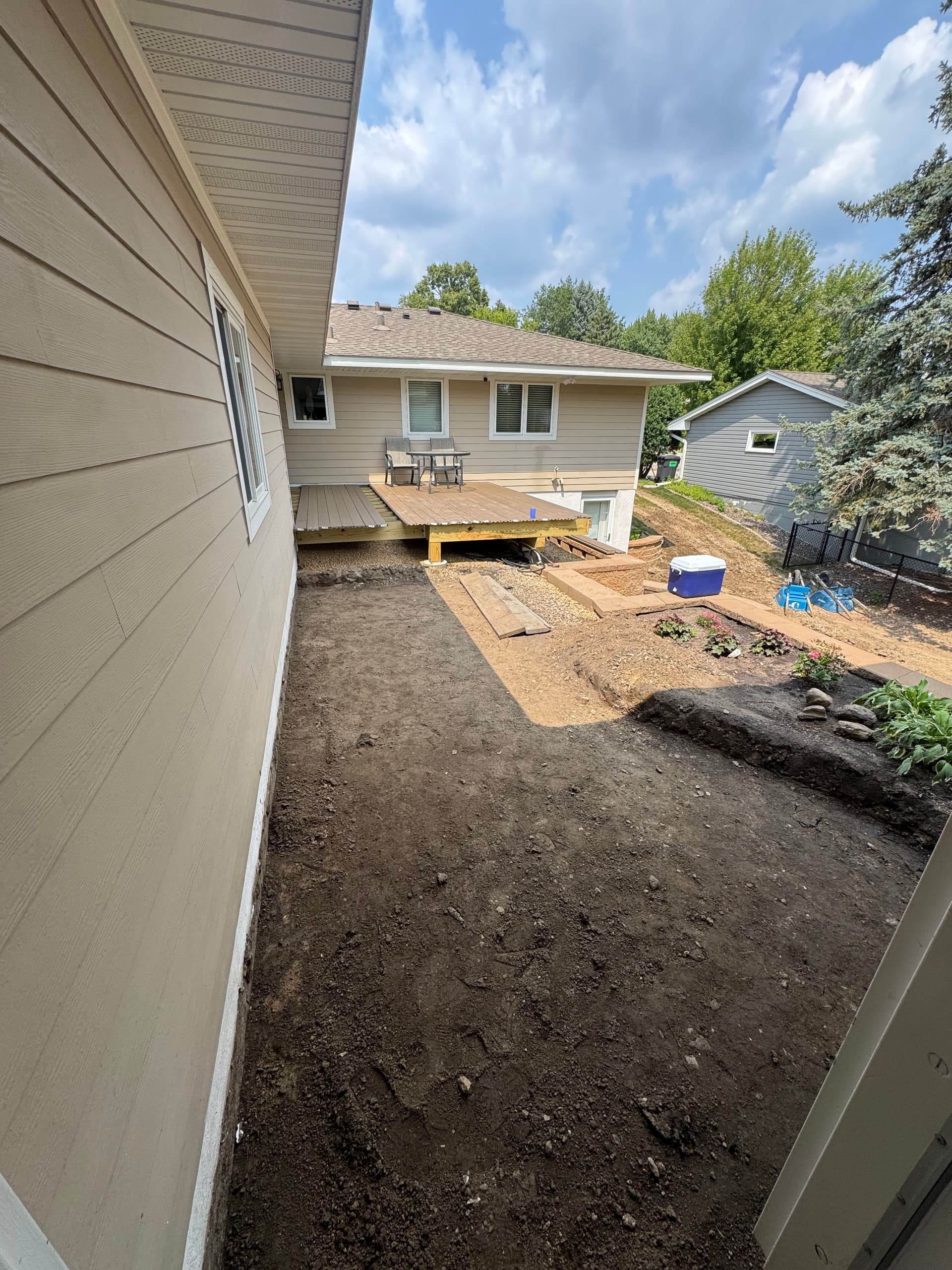 Retaining Wall and Dual Patio Build Taking Shape in Saint Anthony