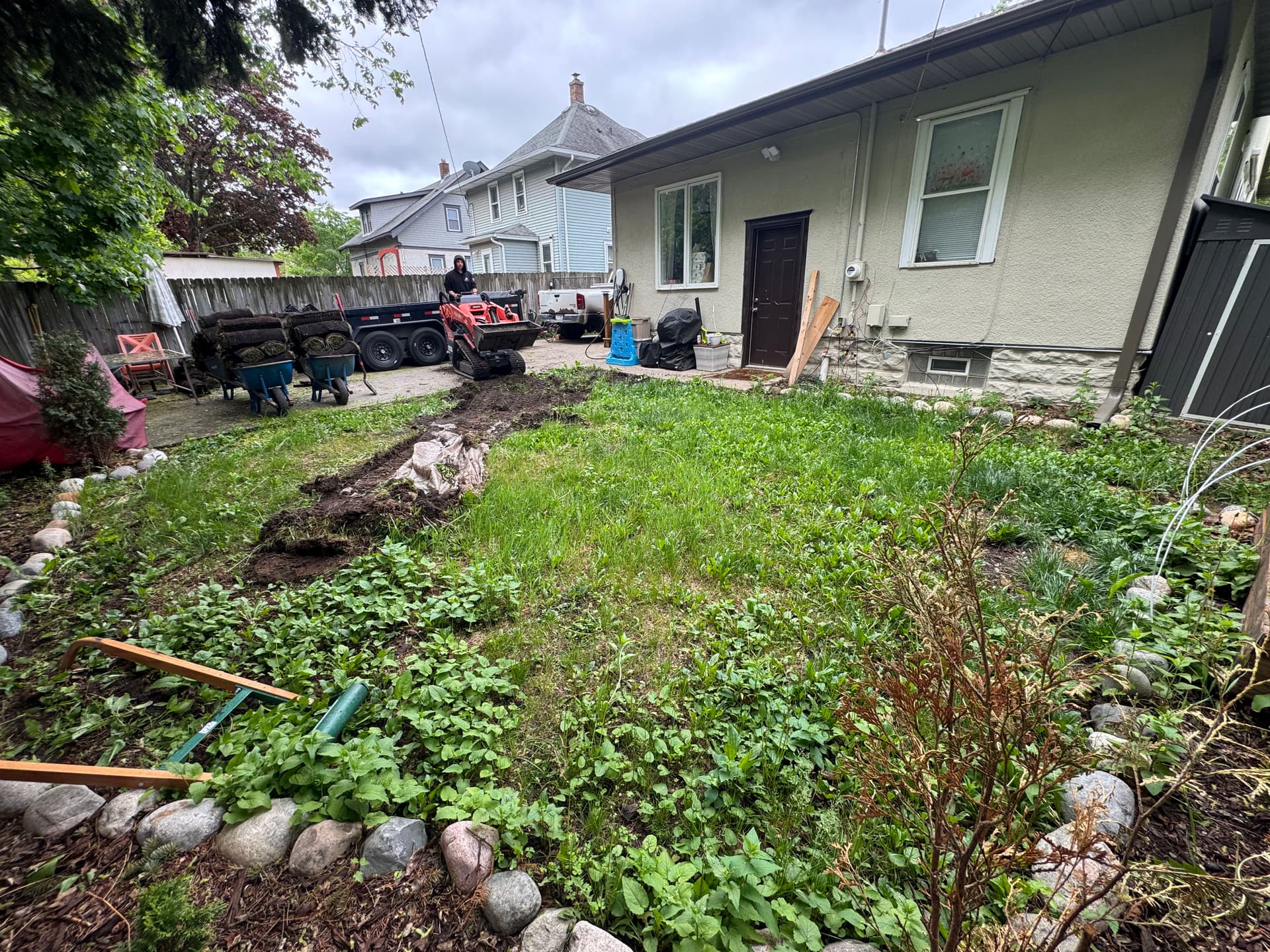 Saint Paul Backyard Gets Clean Soil and Fresh Sod