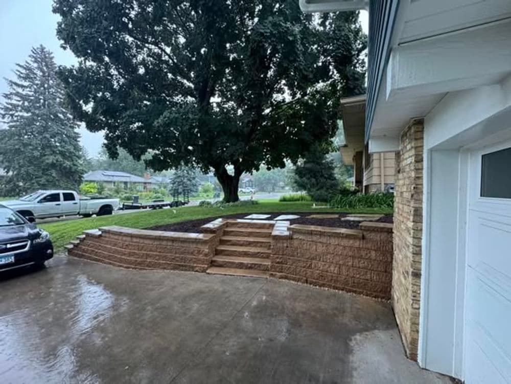 Elevating Outdoor Spaces with Stone Wall and Stair Design in Saint Anthony