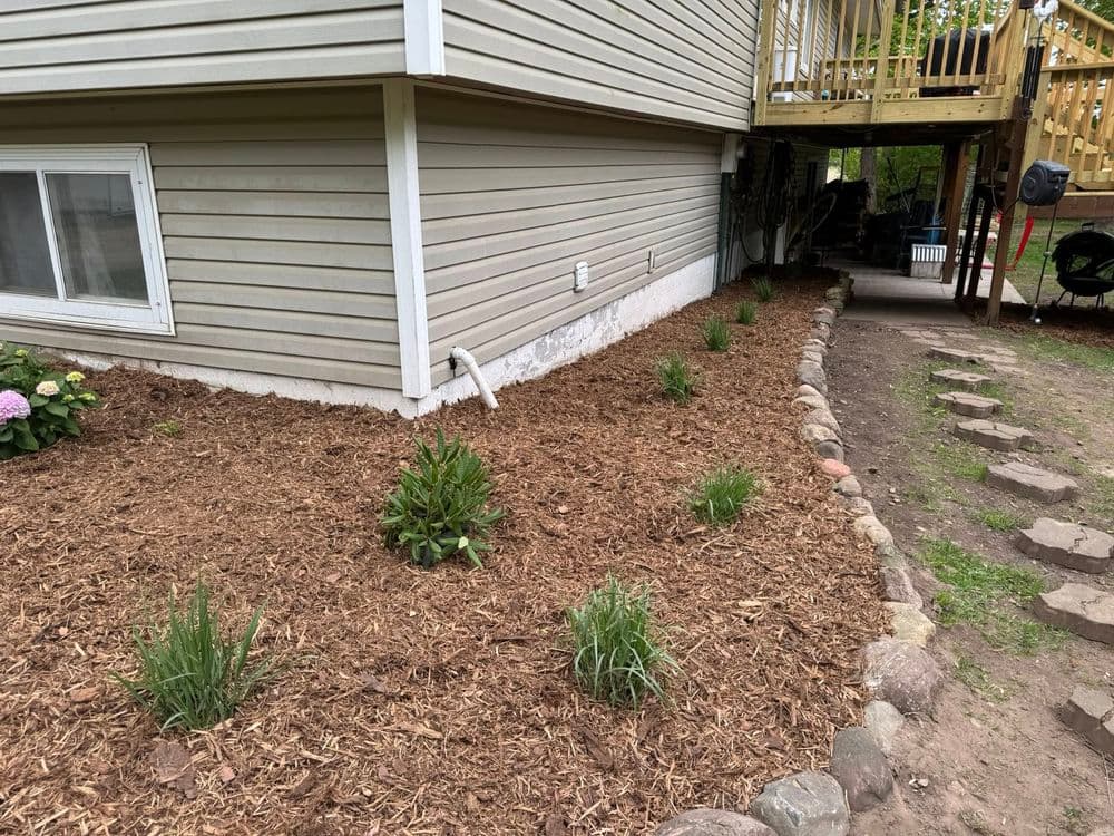 Gallery photos for Transforming Outdoor Spaces in Roseville MN with Mulch and Boulder Edging: Image #2
