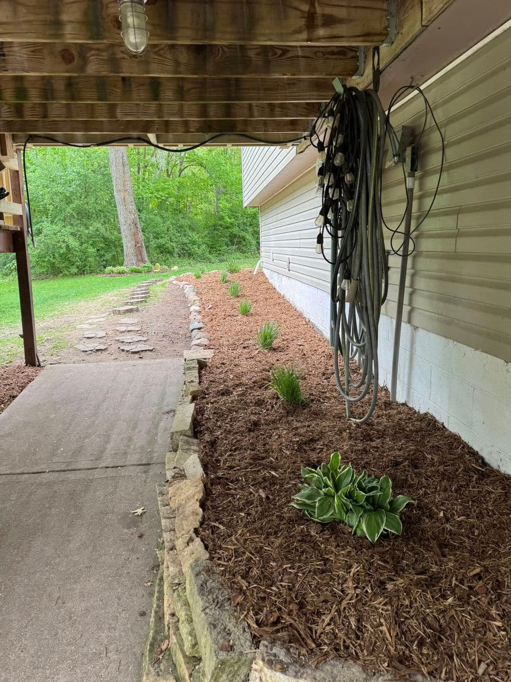 Gallery photos for Transforming Outdoor Spaces in Roseville MN with Mulch and Boulder Edging: Image #1