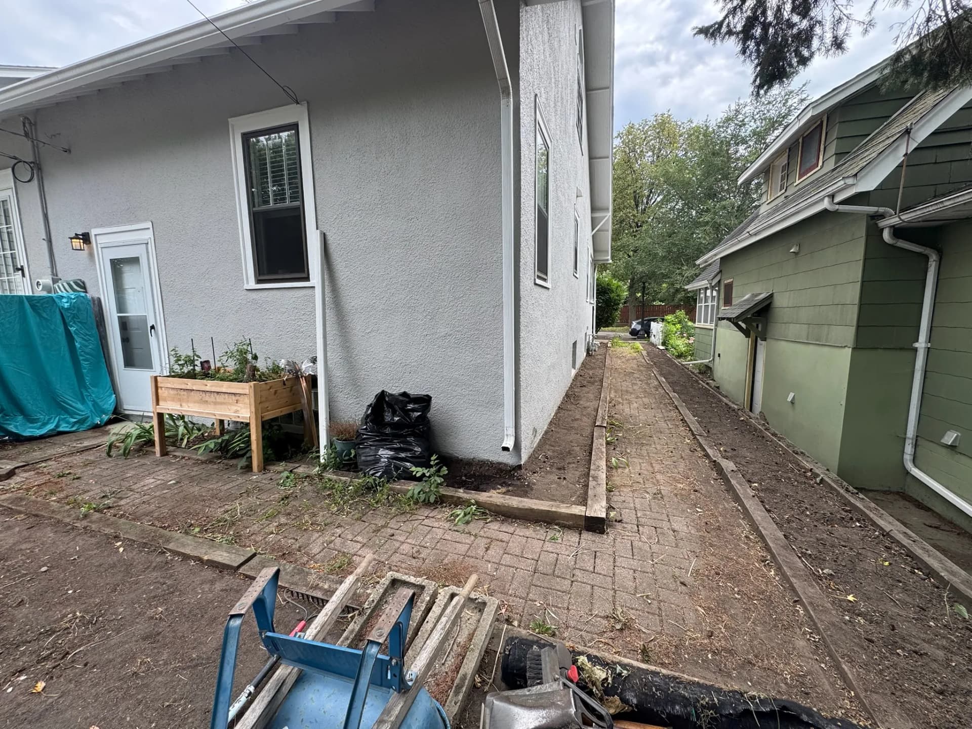 Complete Backyard Rebuild with Paver Patio and Boulder Wall in West St. Paul image
