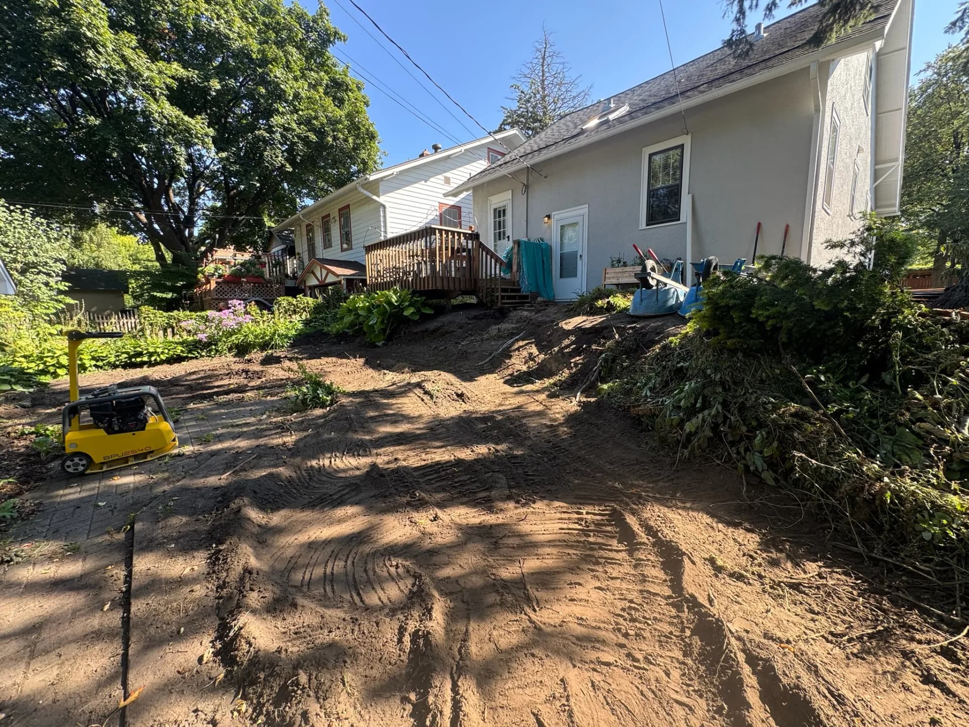 Gallery photos for Complete Backyard Rebuild with Paver Patio and Boulder Wall in West St. Paul: Image #1